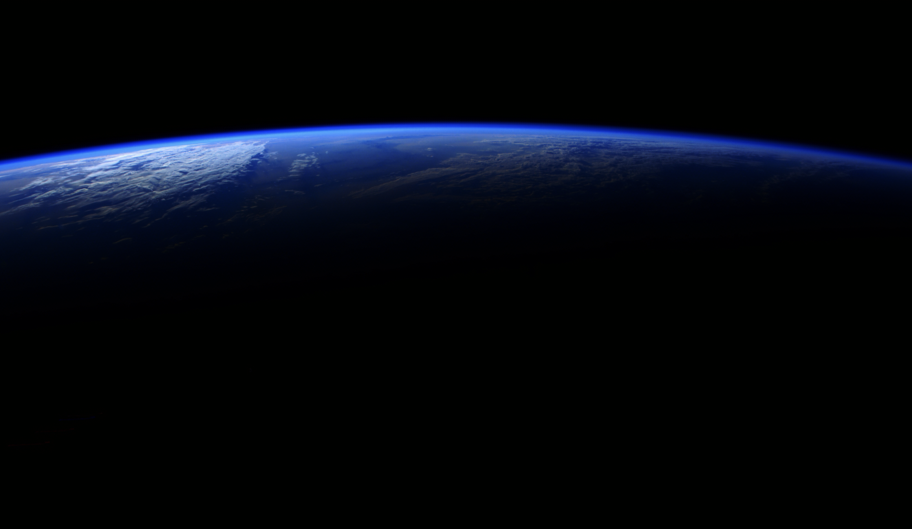 Earth from space with starry background